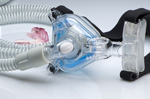 Oral appliance and CPAP mask