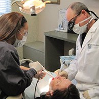 Dr. Hutto treating dental patient