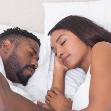 Couple sleeping peacefully, without sleep apnea or snoring