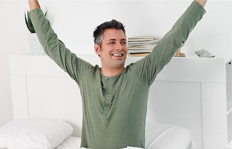 Person waking up feeling refreshed